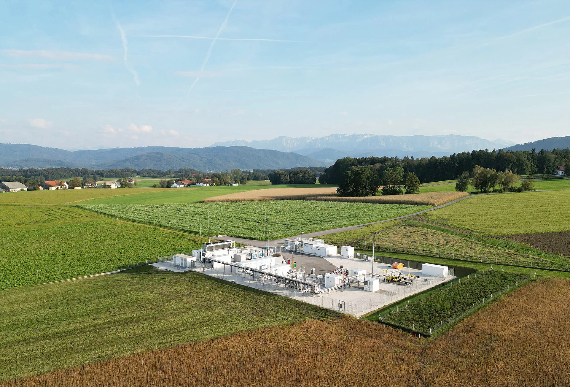 Storage facility Rubensdorf surrounded by green fields with blue sky